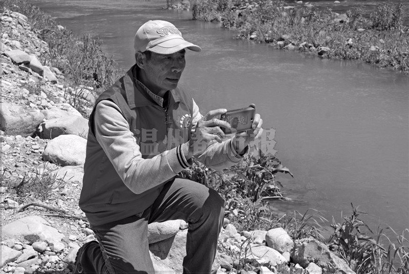 黄金溪畔有位志愿者 30年来用镜头曝光河道